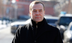 Медведев поздравил с Днем защитника Отечества
